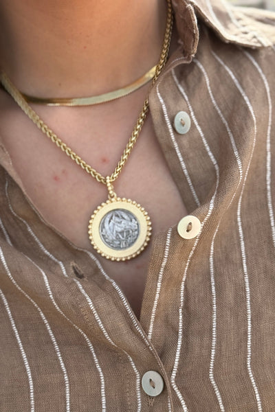 .Royal Crest Coin Pendant