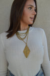Brass Diamond Shield Pendant