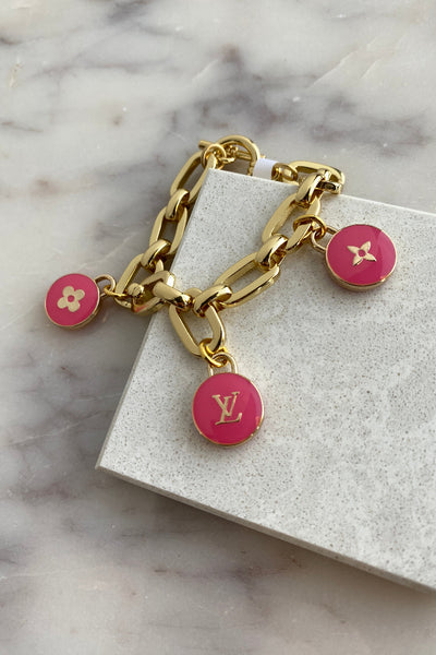 .Designer Toggle Clasp Triple Charm Bracelet, Pink - RUST & Co.