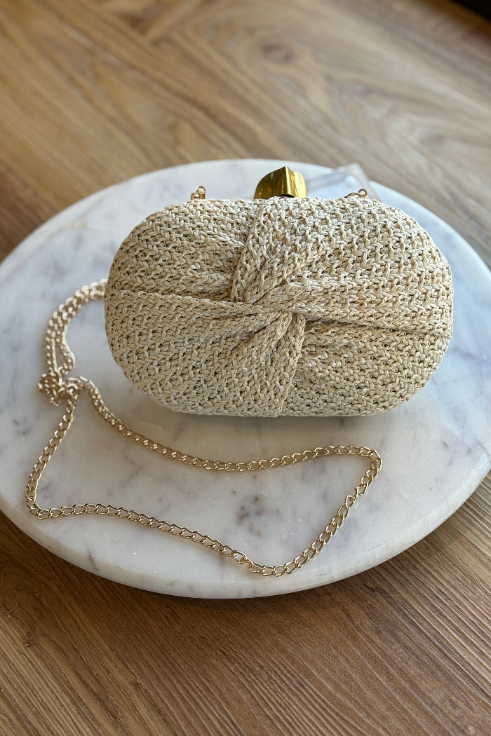 .Maren Rattan Knot Clutch