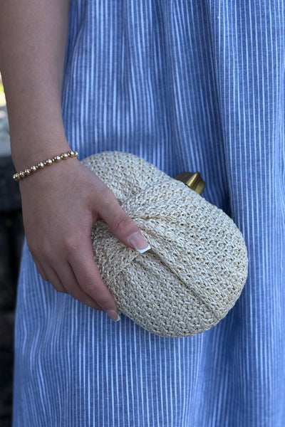 Maren Rattan Knot Clutch