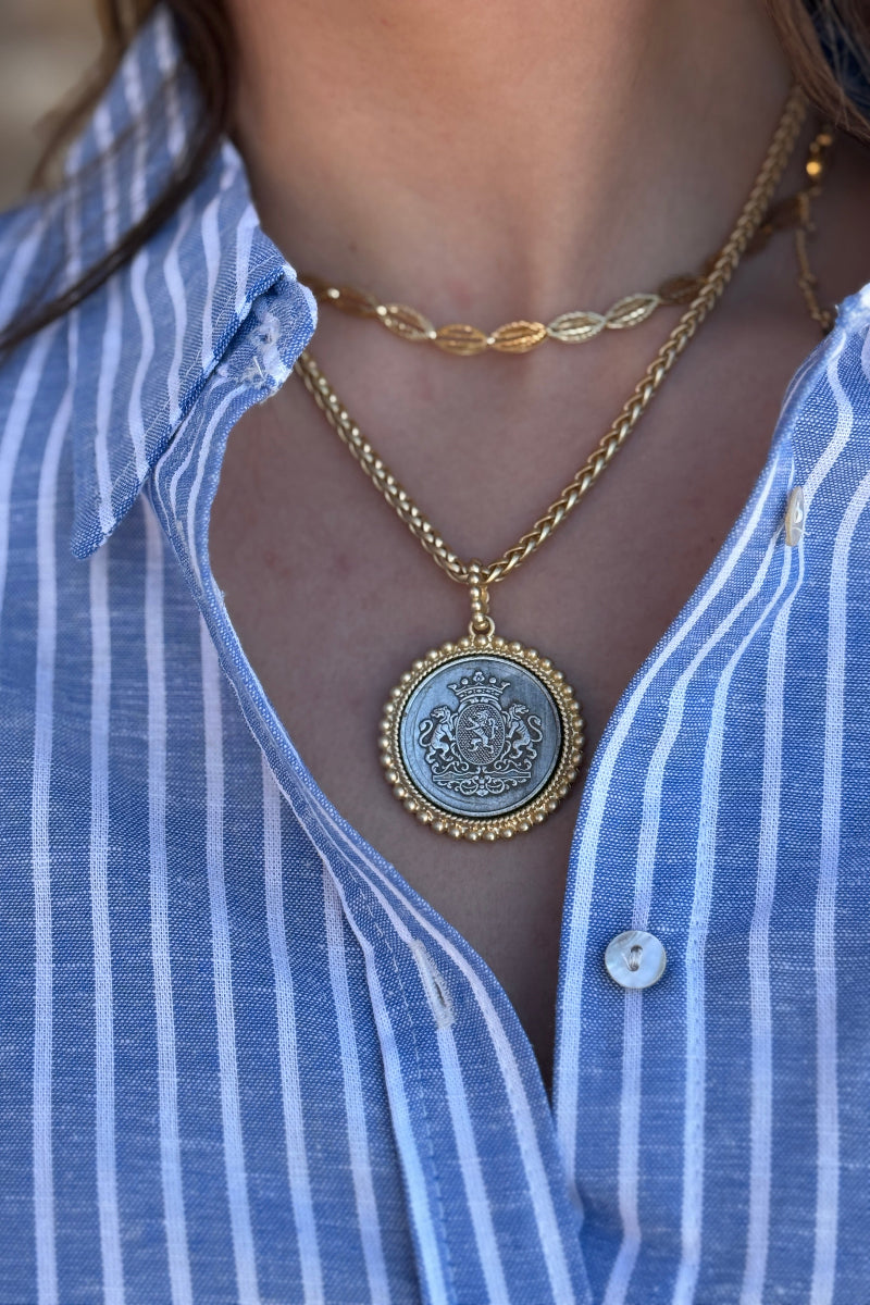.Royal Crest Coin Pendant
