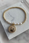 .Designer Gold Pearl Charm Bracelet
