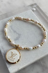 Designer Gold Pearl Charm Bracelet