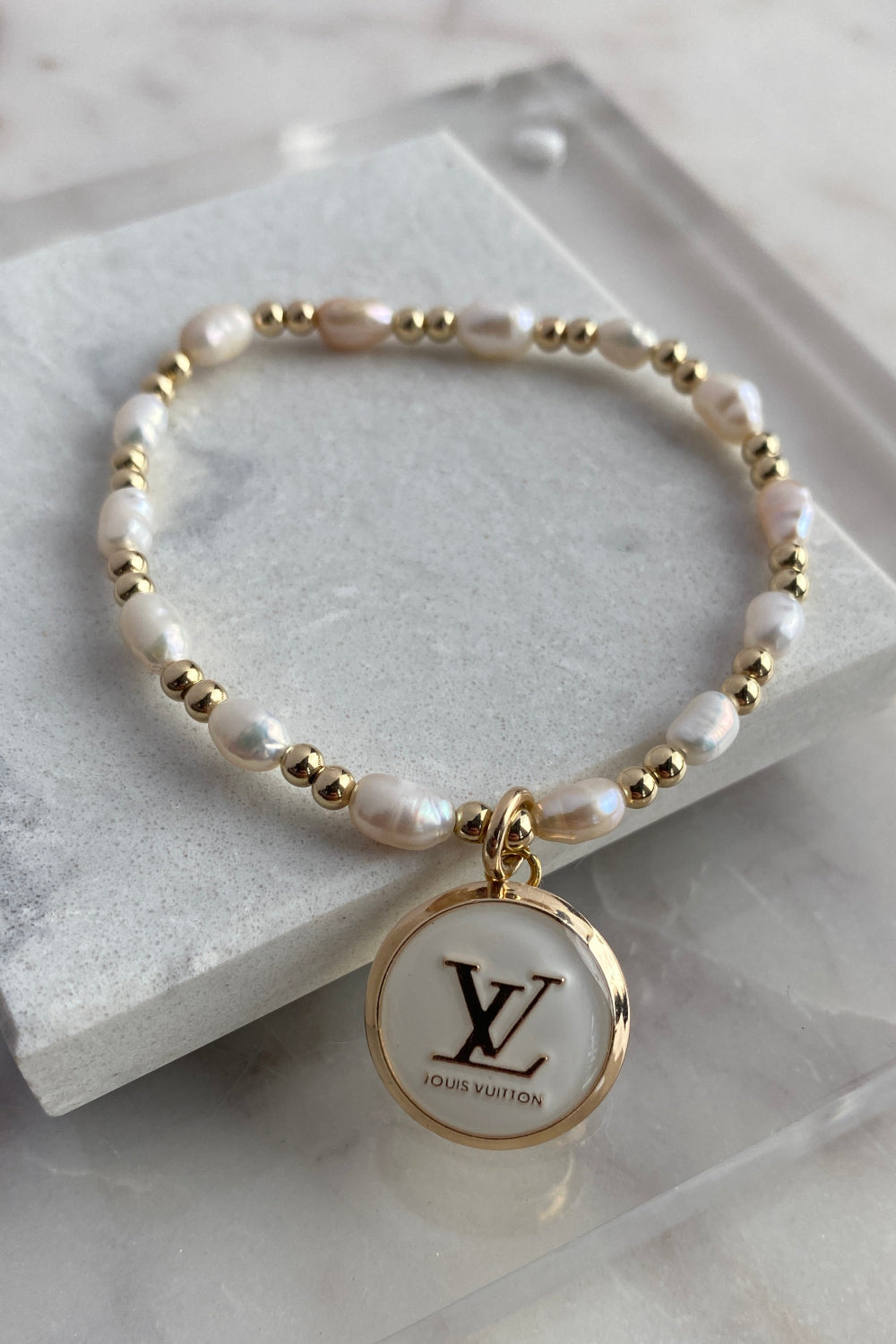 Designer Gold Pearl Charm Bracelet