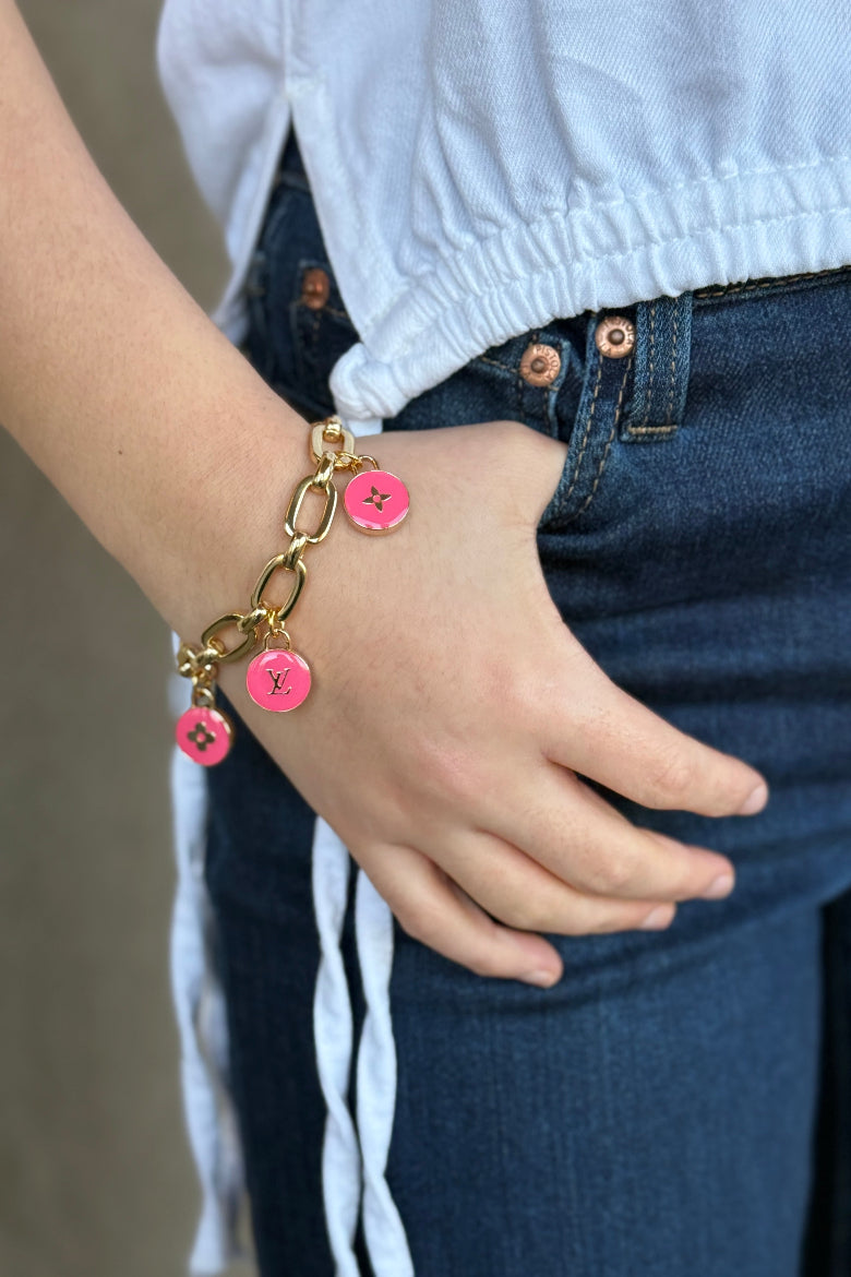 .Designer Toggle Clasp Triple Charm Bracelet, Pink - RUST & Co.