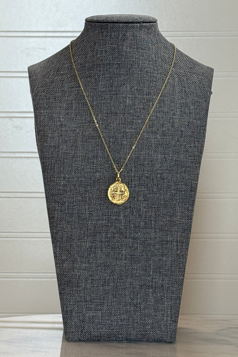 .Embossed Cross Medallion