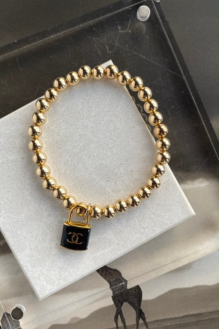 Designer CC Lock Charm & Thick Gold Bead Bracelet, Black